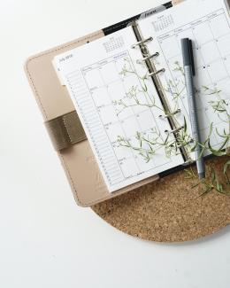 grey and black pen on calendar book by Renáta-Adrienn courtesy of Unsplash.